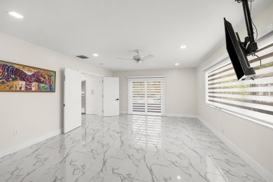 Stunning remodeled 4BR, 3.5BA home with breathtaking golf views on  in Florida - for sale on GolfHomes.com, golf home, golf lot