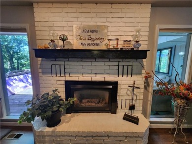 Love mountain biking, golfing, swimming? Less than one mile to on Bella Vista Country Club - Berksdale in Arkansas - for sale on GolfHomes.com, golf home, golf lot