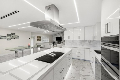 Stunning remodeled 4BR, 3.5BA home with breathtaking golf views on  in Florida - for sale on GolfHomes.com, golf home, golf lot