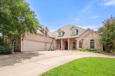 Beautiful Custom Home on elevated corner lot, just down the on Cedar Creek Country Club in Texas - for sale on GolfHomes.com, golf home, golf lot