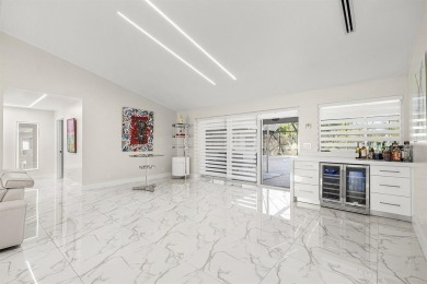 Stunning remodeled 4BR, 3.5BA home with breathtaking golf views on  in Florida - for sale on GolfHomes.com, golf home, golf lot