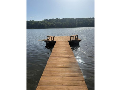 Wonderful lake front home in the piney woods of East Texas on Pine Dunes Golf Course in Texas - for sale on GolfHomes.com, golf home, golf lot