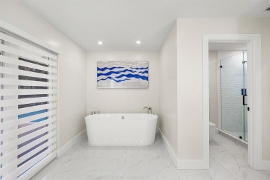 Stunning remodeled 4BR, 3.5BA home with breathtaking golf views on  in Florida - for sale on GolfHomes.com, golf home, golf lot
