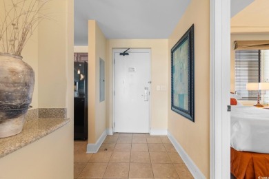 Indulge in sophisticated coastal living at this exquisite condo on Grande Dunes Golf Club in South Carolina - for sale on GolfHomes.com, golf home, golf lot