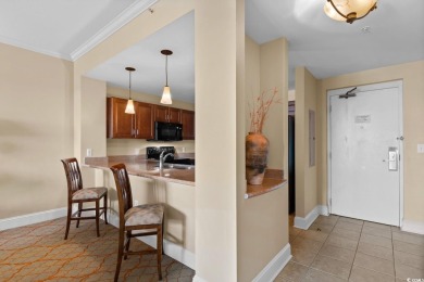 Indulge in sophisticated coastal living at this exquisite condo on Grande Dunes Golf Club in South Carolina - for sale on GolfHomes.com, golf home, golf lot