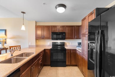 Indulge in sophisticated coastal living at this exquisite condo on Grande Dunes Golf Club in South Carolina - for sale on GolfHomes.com, golf home, golf lot