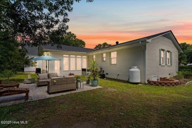 Prepare to be captivated by this extraordinary coastal sanctuary on The Lakes Country Club in North Carolina - for sale on GolfHomes.com, golf home, golf lot