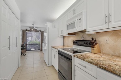 This desirable first floor condo has stunning lake views from on Riviera Golf Club in Florida - for sale on GolfHomes.com, golf home, golf lot