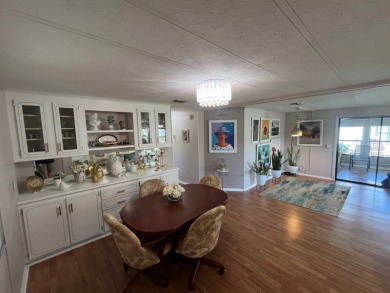 This charming two-bedroom, two-bath home is located in the gated on Lake Fairways Country Club in Florida - for sale on GolfHomes.com, golf home, golf lot