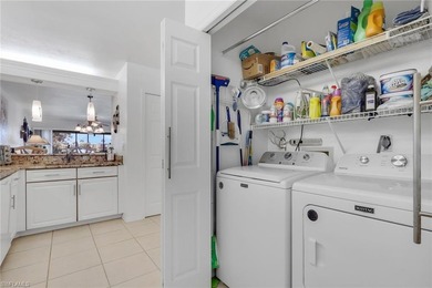 This desirable first floor condo has stunning lake views from on Riviera Golf Club in Florida - for sale on GolfHomes.com, golf home, golf lot