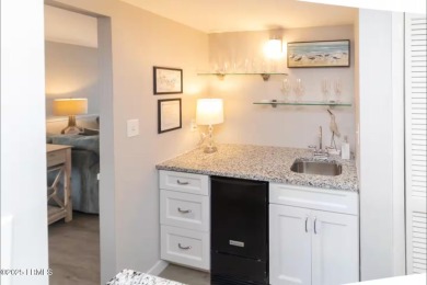 Uncover paradise in this stunning top-floor end unit on Hilton on Palmetto Dunes Golf Course and Resort in South Carolina - for sale on GolfHomes.com, golf home, golf lot