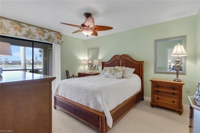 This desirable first floor condo has stunning lake views from on Riviera Golf Club in Florida - for sale on GolfHomes.com, golf home, golf lot