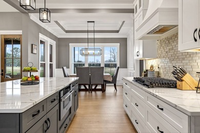 Welcome to Dogwood Drive where Modern Elegance Meets the on Southern Hills Golf and Country Club in Tennessee - for sale on GolfHomes.com, golf home, golf lot