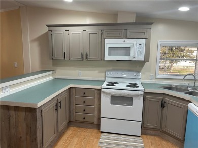 Park East is an age 55+ Resident Owned Cooperative (Co-op) on Polo Park East in Florida - for sale on GolfHomes.com, golf home, golf lot
