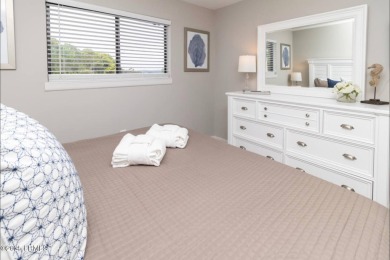 Uncover paradise in this stunning top-floor end unit on Hilton on Palmetto Dunes Golf Course and Resort in South Carolina - for sale on GolfHomes.com, golf home, golf lot