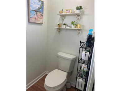 This charming two-bedroom, two-bath home is located in the gated on Lake Fairways Country Club in Florida - for sale on GolfHomes.com, golf home, golf lot