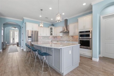 WATERFRONT RETREAT ON RIVERWALK! Welcome to your serene on Grand Haven Golf Club in Florida - for sale on GolfHomes.com, golf home, golf lot