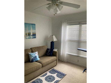 This desirable first floor condo has stunning lake views from on Riviera Golf Club in Florida - for sale on GolfHomes.com, golf home, golf lot