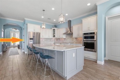WATERFRONT RETREAT ON RIVERWALK! Welcome to your serene on Grand Haven Golf Club in Florida - for sale on GolfHomes.com, golf home, golf lot