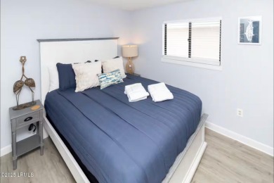 Uncover paradise in this stunning top-floor end unit on Hilton on Palmetto Dunes Golf Course and Resort in South Carolina - for sale on GolfHomes.com, golf home, golf lot