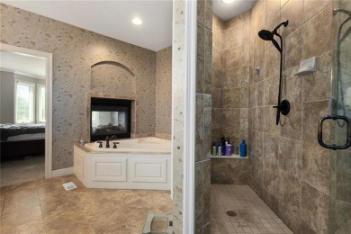 Perched majestically on the 11th hole of the prestigious Tiffany on Tiffany Greens Golf Club in Missouri - for sale on GolfHomes.com, golf home, golf lot