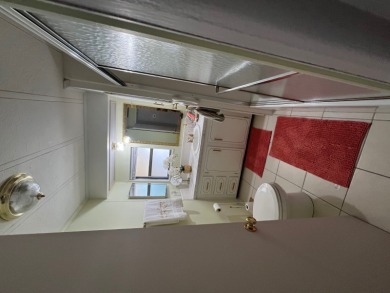 This charming two-bedroom, two-bath home is located in the gated on Lake Fairways Country Club in Florida - for sale on GolfHomes.com, golf home, golf lot