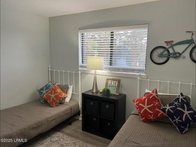 Uncover paradise in this stunning top-floor end unit on Hilton on Palmetto Dunes Golf Course and Resort in South Carolina - for sale on GolfHomes.com, golf home, golf lot