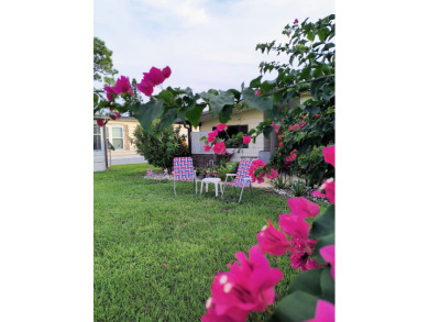 This charming two-bedroom, two-bath home is located in the gated on Lake Fairways Country Club in Florida - for sale on GolfHomes.com, golf home, golf lot
