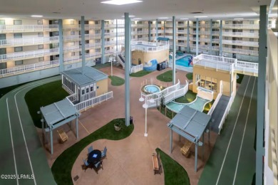 Uncover paradise in this stunning top-floor end unit on Hilton on Palmetto Dunes Golf Course and Resort in South Carolina - for sale on GolfHomes.com, golf home, golf lot