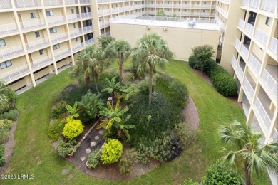 Uncover paradise in this stunning top-floor end unit on Hilton on Palmetto Dunes Golf Course and Resort in South Carolina - for sale on GolfHomes.com, golf home, golf lot