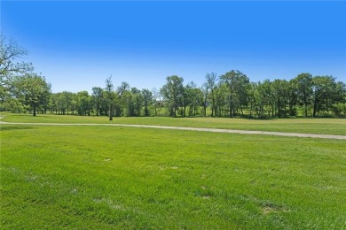 Perched majestically on the 11th hole of the prestigious Tiffany on Tiffany Greens Golf Club in Missouri - for sale on GolfHomes.com, golf home, golf lot