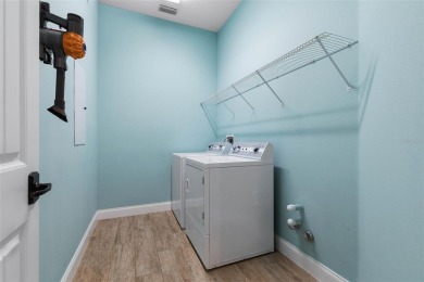 WATERFRONT RETREAT ON RIVERWALK! Welcome to your serene on Grand Haven Golf Club in Florida - for sale on GolfHomes.com, golf home, golf lot