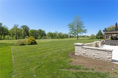 Perched majestically on the 11th hole of the prestigious Tiffany on Tiffany Greens Golf Club in Missouri - for sale on GolfHomes.com, golf home, golf lot
