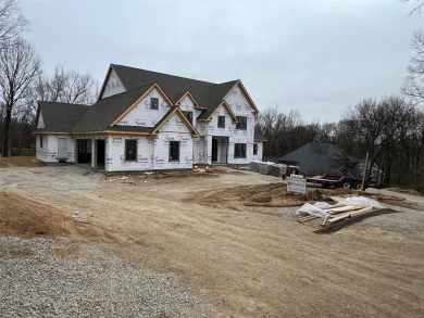 Custom home under construction by Rehnquist Design & Build on Sunset Country Club in Missouri - for sale on GolfHomes.com, golf home, golf lot