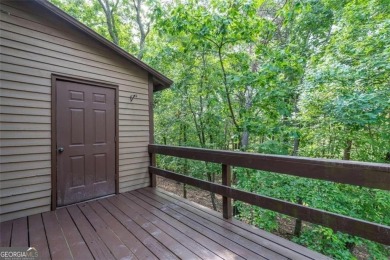 Beautiful Lake Arrowhead setting for this terrific 2 bed 2 1/2 on The Highlands Course at Lake Arrowhead in Georgia - for sale on GolfHomes.com, golf home, golf lot