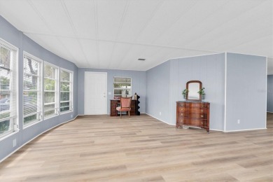 Spacious  Inviting Corner Lot Home in Palm Hill Country Club - on Palm Hill Golf Club in Florida - for sale on GolfHomes.com, golf home, golf lot