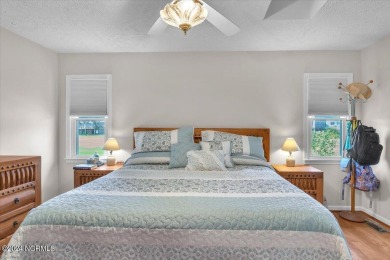 Enjoy true Coastal living at this stunning 3 bedroom, 2-bath on Oak Island Golf Club in North Carolina - for sale on GolfHomes.com, golf home, golf lot