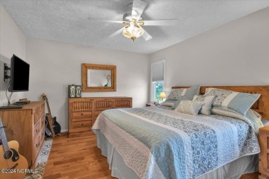 Enjoy true Coastal living at this stunning 3 bedroom, 2-bath on Oak Island Golf Club in North Carolina - for sale on GolfHomes.com, golf home, golf lot