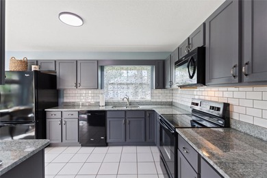 One or more photo(s) has been virtually staged. Furnished and on Ridgewood Lakes Golf and Country Club in Florida - for sale on GolfHomes.com, golf home, golf lot