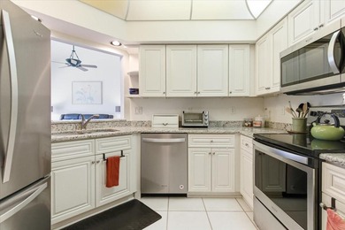 This beautiful pond view 2-bedroom, 2-bath first floor condo on on Tara Golf and Country Club in Florida - for sale on GolfHomes.com, golf home, golf lot