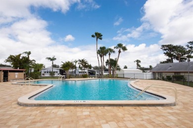 Spacious  Inviting Corner Lot Home in Palm Hill Country Club - on Palm Hill Golf Club in Florida - for sale on GolfHomes.com, golf home, golf lot