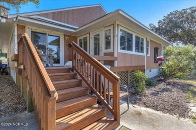 Enjoy true Coastal living at this stunning 3 bedroom, 2-bath on Oak Island Golf Club in North Carolina - for sale on GolfHomes.com, golf home, golf lot