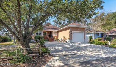 Enjoy true Coastal living at this stunning 3 bedroom, 2-bath on Oak Island Golf Club in North Carolina - for sale on GolfHomes.com, golf home, golf lot