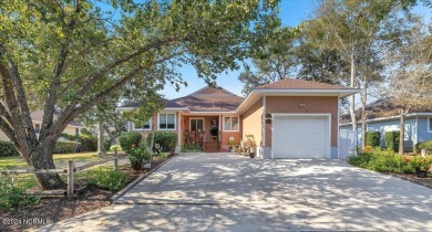 Enjoy true Coastal living at this stunning 3 bedroom, 2-bath on Oak Island Golf Club in North Carolina - for sale on GolfHomes.com, golf home, golf lot