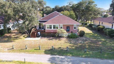 Enjoy true Coastal living at this stunning 3 bedroom, 2-bath on Oak Island Golf Club in North Carolina - for sale on GolfHomes.com, golf home, golf lot