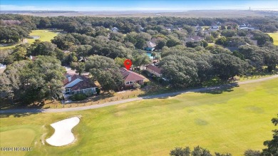 Enjoy true Coastal living at this stunning 3 bedroom, 2-bath on Oak Island Golf Club in North Carolina - for sale on GolfHomes.com, golf home, golf lot