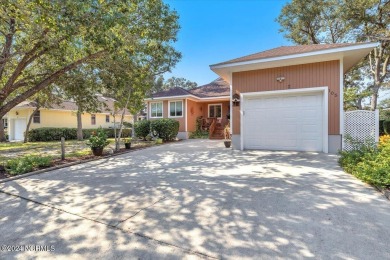 Enjoy true Coastal living at this stunning 3 bedroom, 2-bath on Oak Island Golf Club in North Carolina - for sale on GolfHomes.com, golf home, golf lot