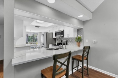 Exquisite 2-Bedroom Villa in the Heart of Seven Springs Golf on Seven Springs Golf and Country Club in Florida - for sale on GolfHomes.com, golf home, golf lot