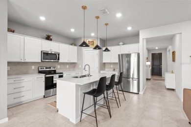 Welcome to 9459 SW 52nd Loop, a beautifully enhanced Cedar model on Stone Creek Golf Club in Florida - for sale on GolfHomes.com, golf home, golf lot
