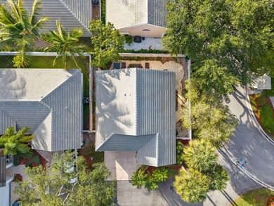 Beautifully remodeled single-story home offering 2 bedrooms, 2 on PGA National Golf Club in Florida - for sale on GolfHomes.com, golf home, golf lot